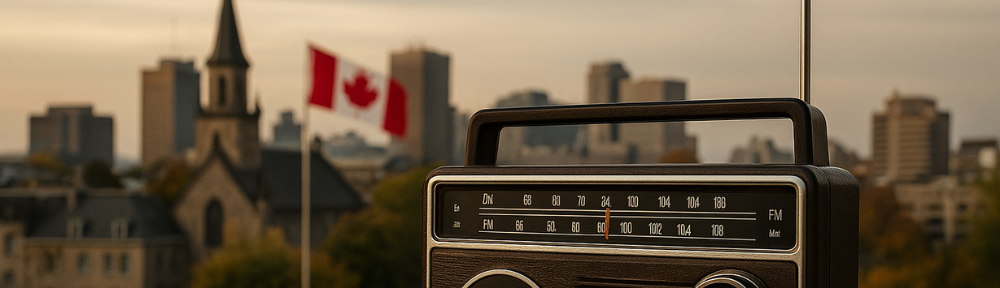 A portable radio on a stone ledge with a Canadian city skyline and flag in the background at sunset.